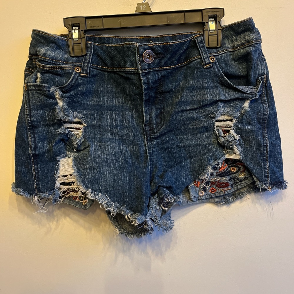 Maurices Dark Blue Ripped Jean Shorts with embroidered Pockets